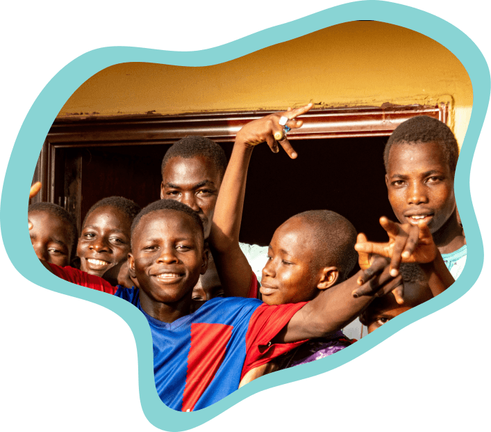 Happy students raising their hands and smiling